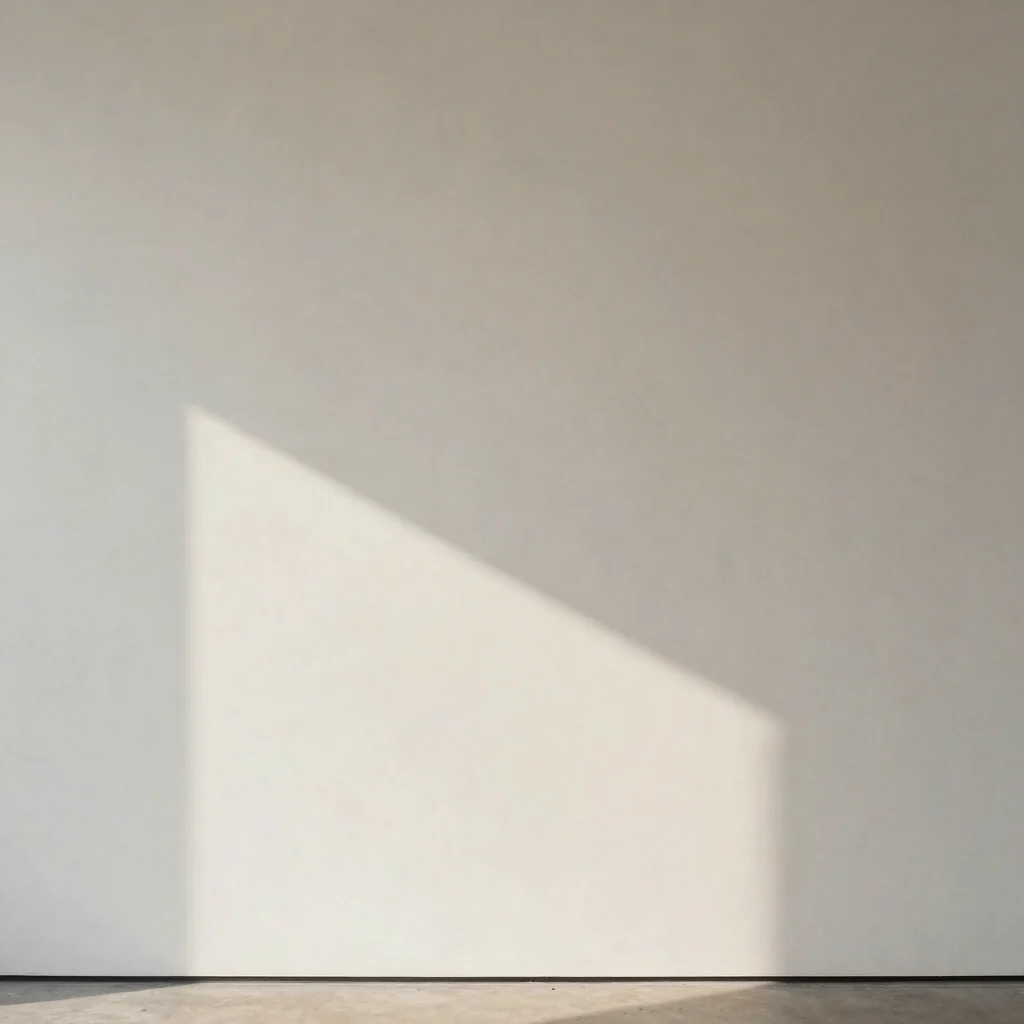 Editorial artwork photography of a soft shadow falling across a pale wall, neutral gallery tones, soft diffused daylight